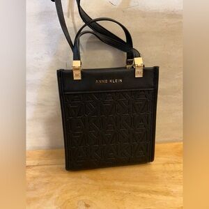 Anne Klein Monogrammed Black Embossed Logo Small Crossbody with Gold Hardware